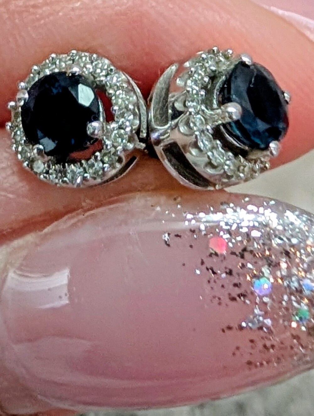 White gold and blue sapphire stud earrings